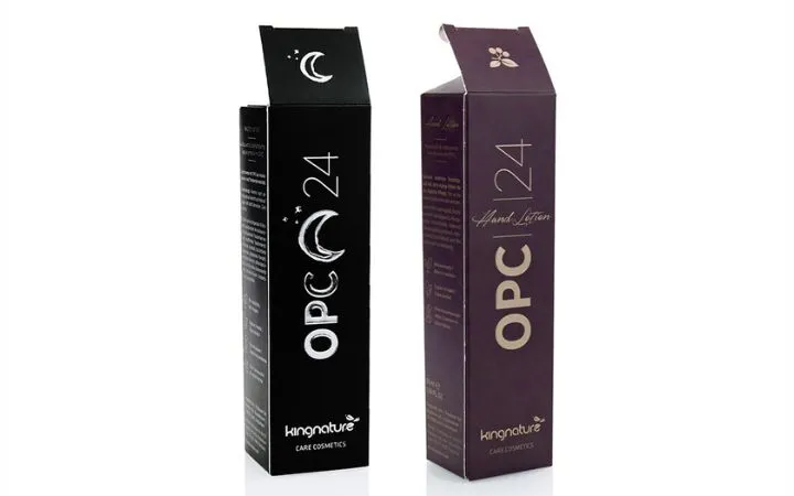 Marquage à froid sur des boîtes pliantes noires