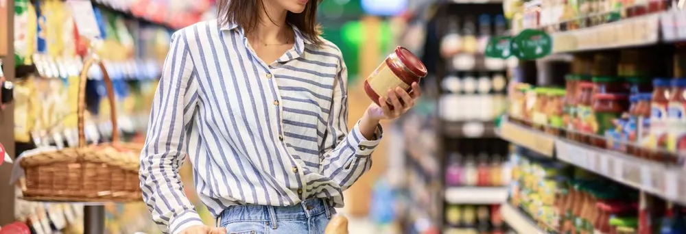 woman buying groceries in supermarket woman buying groceries in supermarket