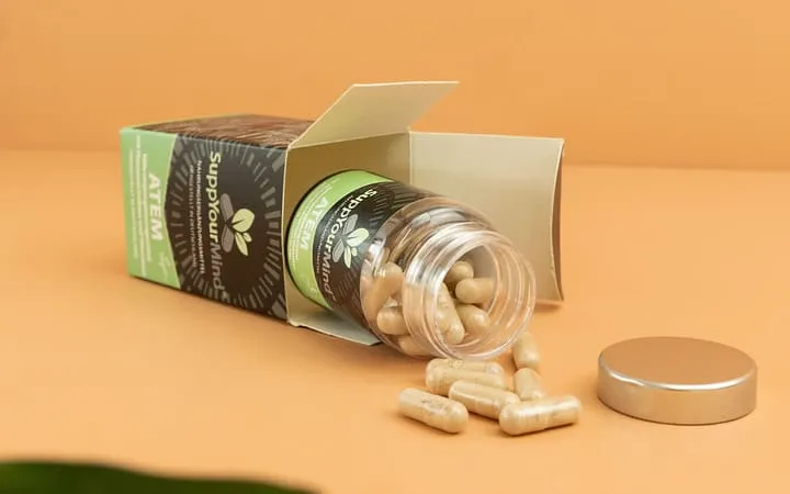 Boîte pliante et récipient en verre