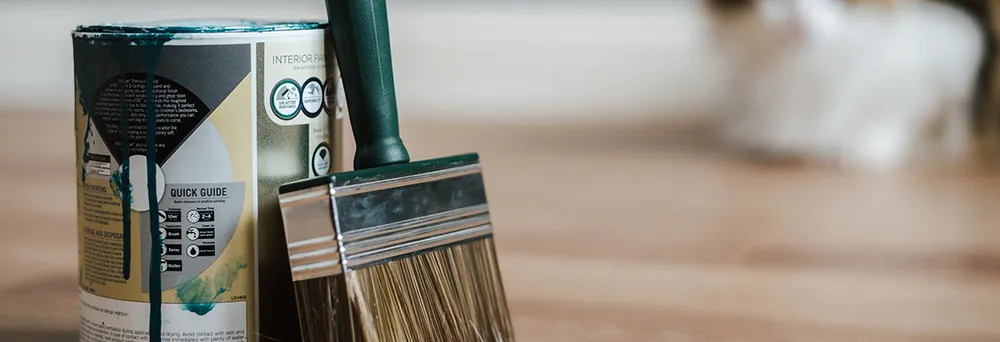 Brush and paint bucket with sandwich label Brush and paint bucket with sandwich label