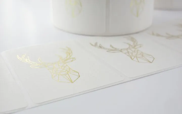 Adhesive labels on rolls