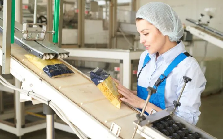 Woman checking food packaging Woman checking food packaging