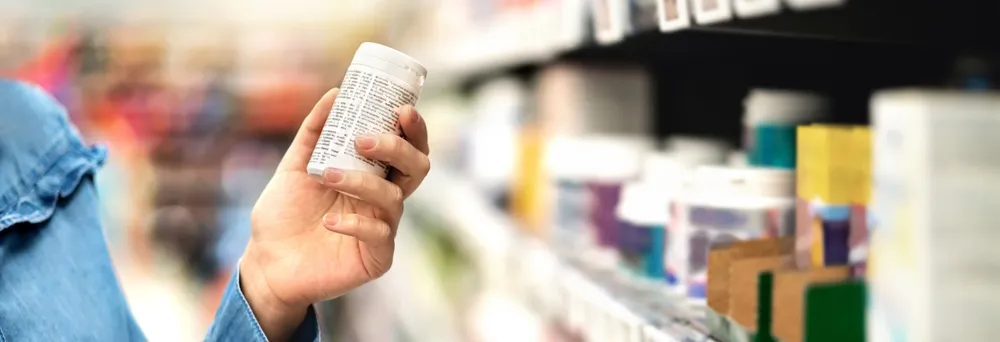 women with medication in the hand
