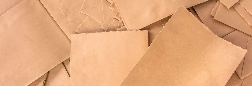 Kraft paper bags lying on top of each other