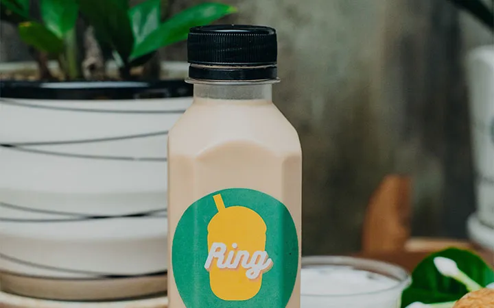 Sandwich label on cocoa bottle 